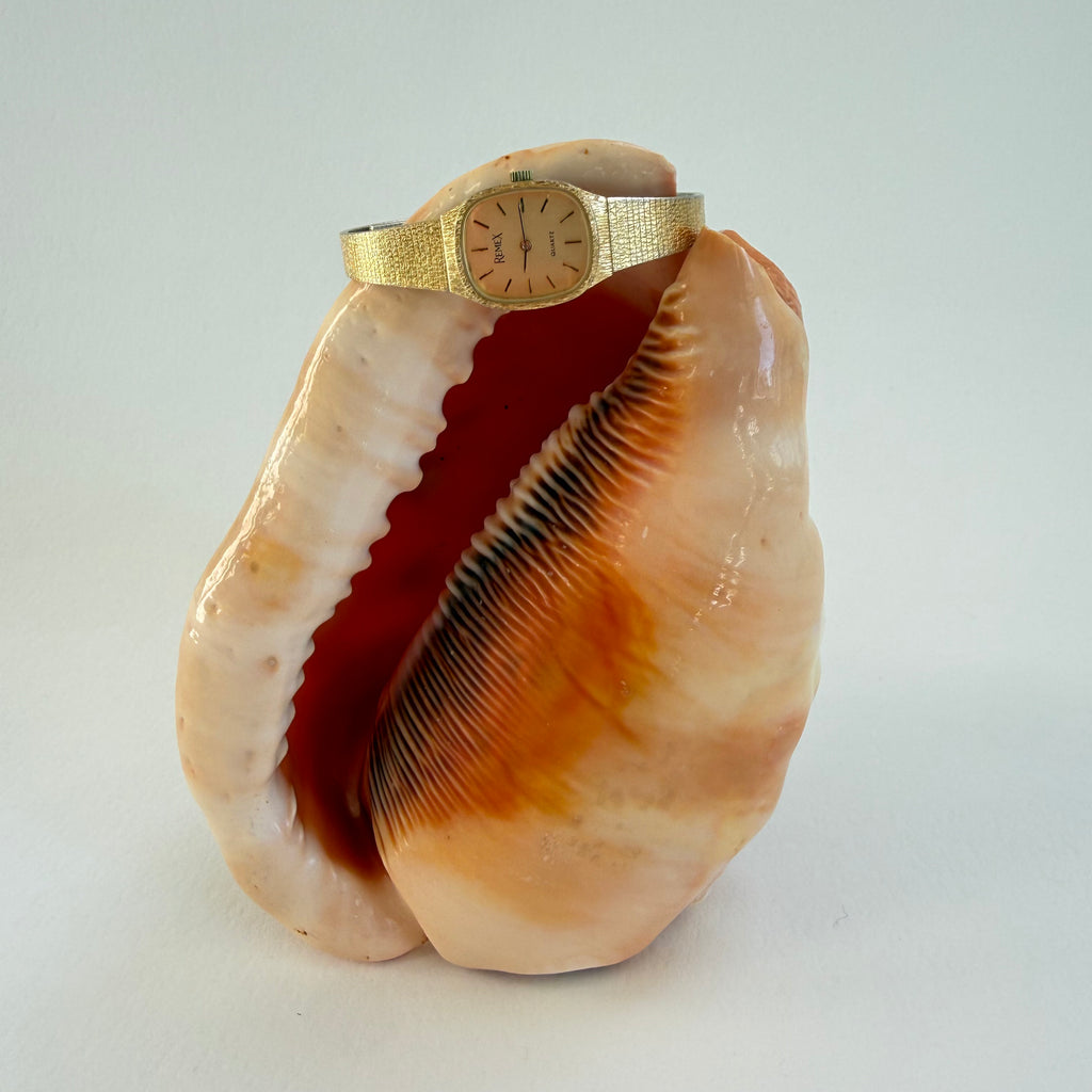 GOLD OVAL WRIST WATCH