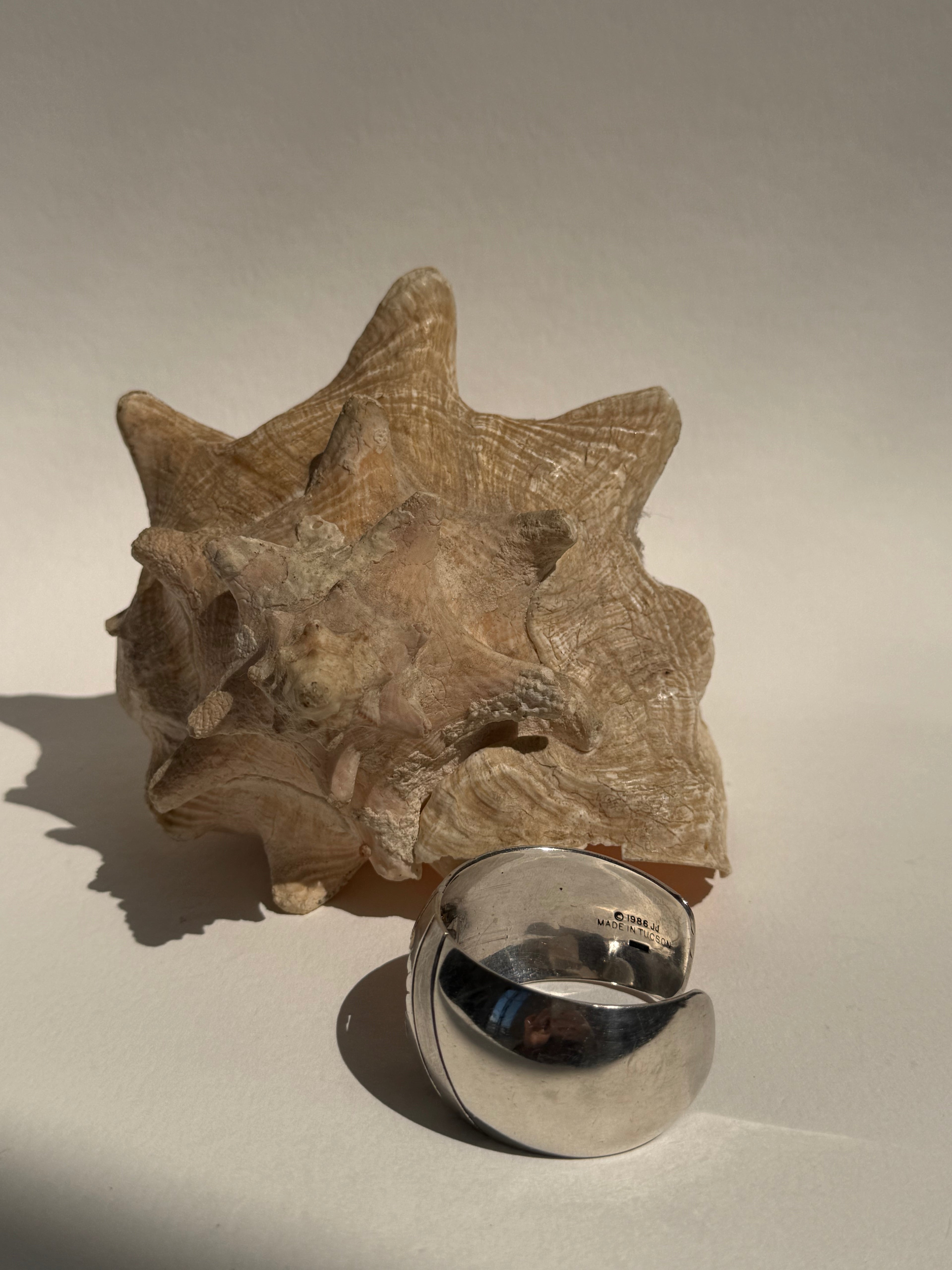 SILVER NATIVE AMERICAN SIDE CARVED CUFF WATCH