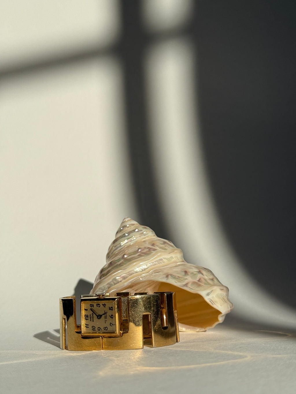 GOLD ANGULAR CUT BANGLE WATCH